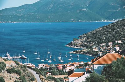 High angle view of townscape by sea