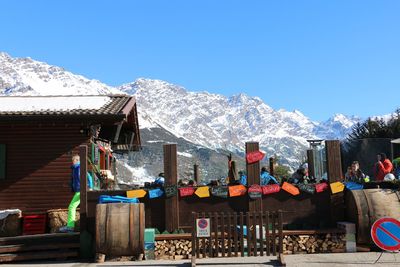 Buildings against blue sky during winter