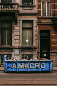 Low angle view of text on building