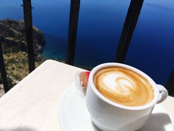 Close-up of cappuccino on table