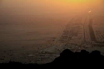 Scenic view of landscape at sunset