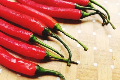 Close-up of chili peppers on table