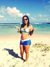 Woman standing on beach