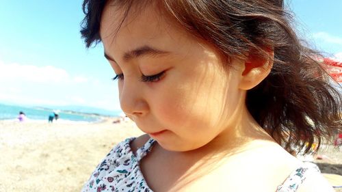 Close-up of boy on beach