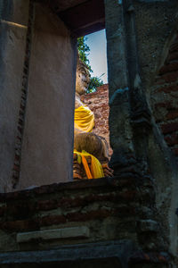 Low angle view of buddha statue