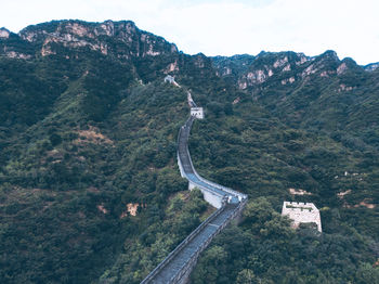 High angle view of road amidst mountains against sky
