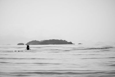 Scenic view of sea against clear sky