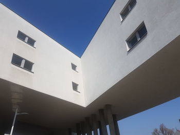 Low angle view of buildings against clear sky