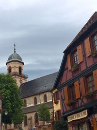 Exterior of buildings against sky in city