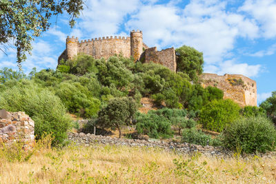 View of fort against cloudy sky