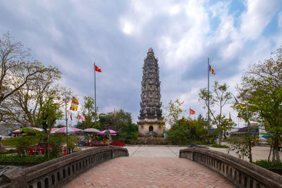 View of historical building against cloudy sky