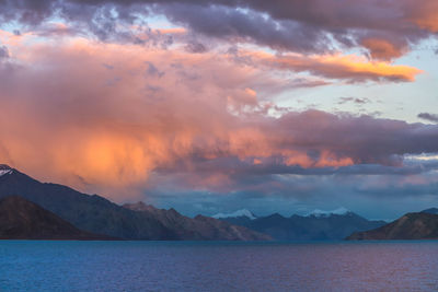 Scenic view of mountains against sky during sunset
