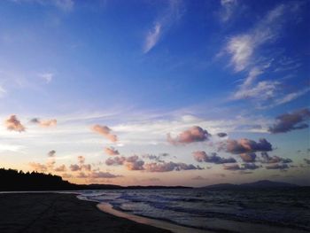 Scenic view of sea against cloudy sky