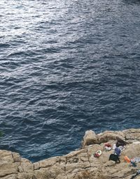 High angle view of rocks in sea