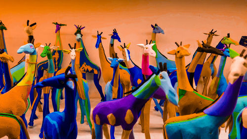 Handmade giraffes crafted from flip flops extol the talent of a cape town artist. 