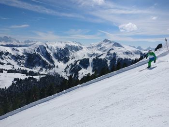 Scenic view of snowcapped mountain against sky