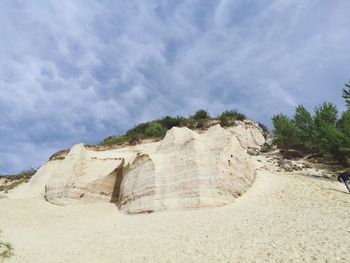 Scenic view of sand against sky