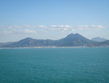 Scenic view of sea against cloudy sky