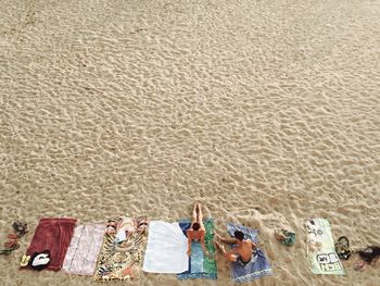 High angle view of people relaxing at beach