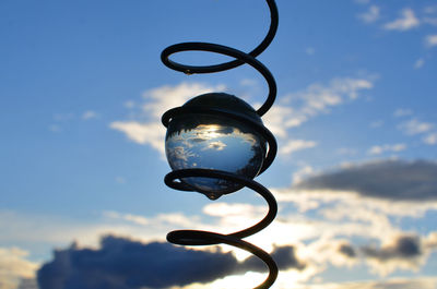 Low angle view of metallic structure against sky