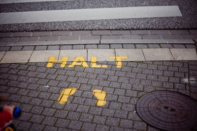 High angle view of text on street