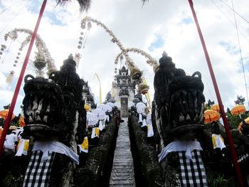 Low angle view of statue against sky