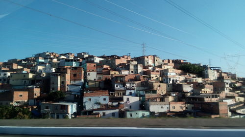Residential buildings against clear sky