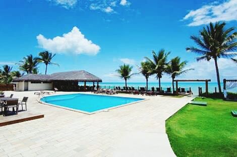 LOUNGE CHAIRS AT SWIMMING POOL