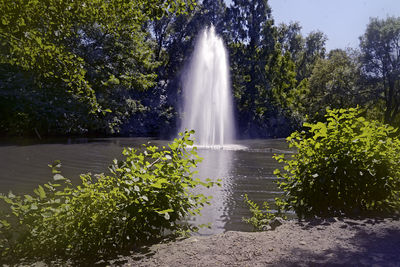 Fountain in pond at park