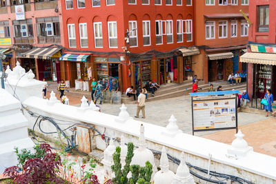 High angle view of people on building in city