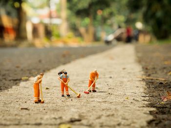 Close-up of toys on the road