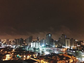 View of city lit up at night