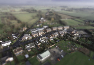 Aerial view of field against sky