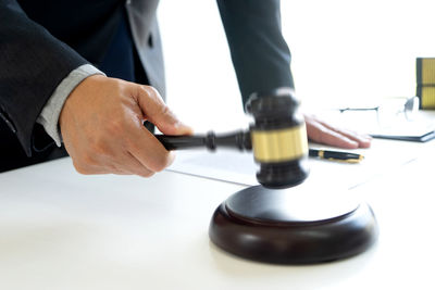 Close-up of man working on table