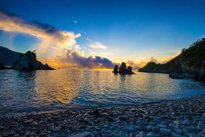 Scenic view of sea against sky during sunset