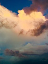 Low angle view of clouds in sky during sunset