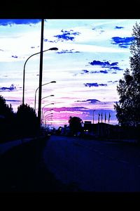 Road against sky at sunset