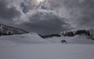 Scenic view of snow covered mountains