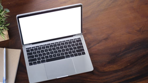 Close-up of laptop on table