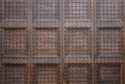 Full frame shot of brown wooden door