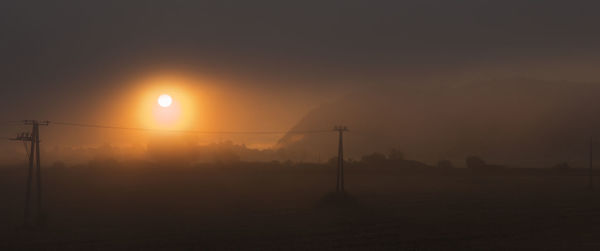 Power lines on landscape