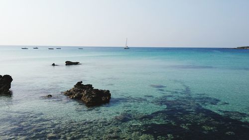 Scenic view of sea against clear sky