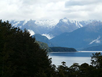 Scenic view of lake against cloudy sky