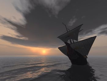 Scenic view of sea at sunset