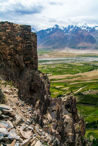 View of landscape against cloudy sky