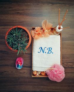 High angle view of pink flower on table