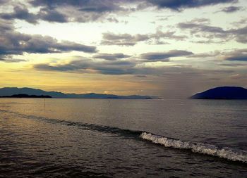 Scenic view of calm sea against sky