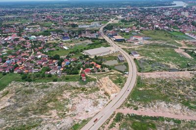 High angle view of road amidst buildings in city