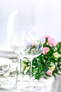 Close-up of wineglasses on table