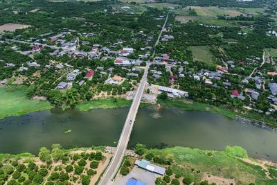 High angle view of river amidst buildings in city